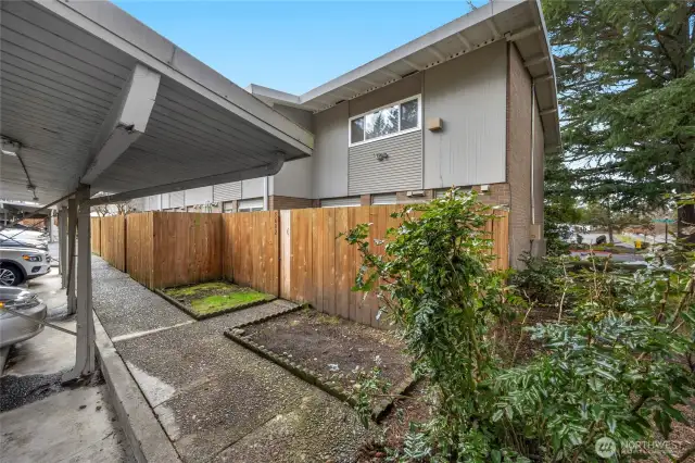 The only unit with an EV charger. The covered assigned parking is directly behind the home. This is rare in this subdivision.