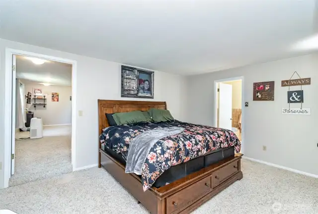 Additional Angle of the Primary Bedroom Looking Left to a Secondary Bedroom & Right to the Attached Bathroom~