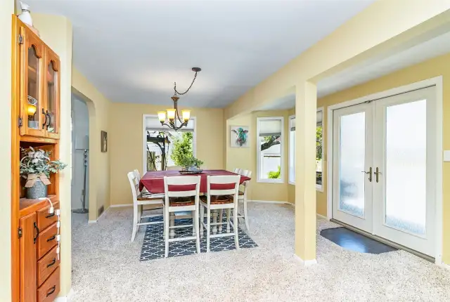Looking from the Kitchen to the Dining Room~Built in Oak Hutch~Coffee Bar~Liquor Closet~Curio Catch All~