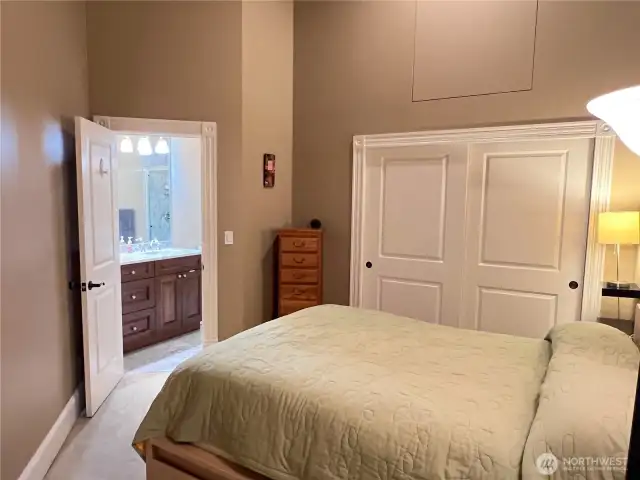 Primary bedroom with adjoining 3/4 bath.