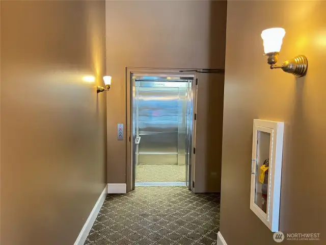 Hallway from Water St. entry door to elevator to 3rd & 4th floors of Eisenbeis building.