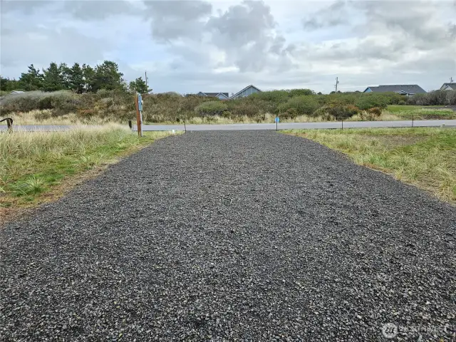 Long driveway/RV pad.