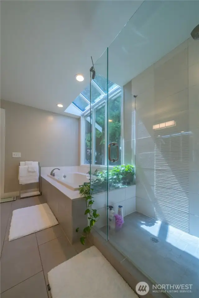 Great view of the remodeled walk-in shower and soaking tub.