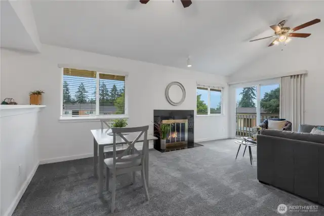 New Carpet and paint, vaulted ceilings in the living room, and plenty of natural light in this corner unit!