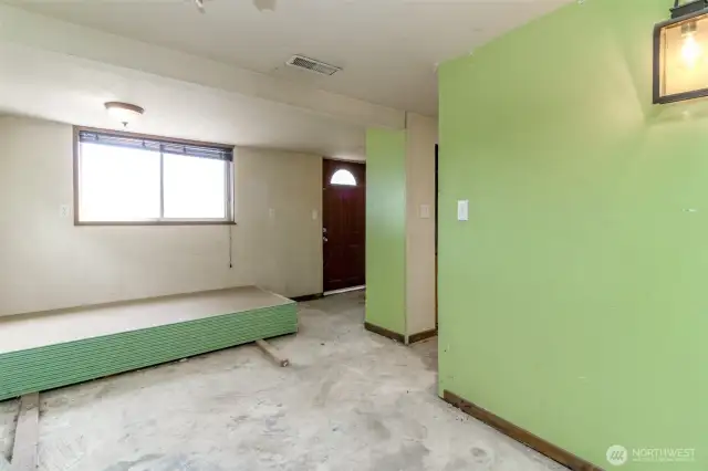 Unfinished daylight basement with potential -
