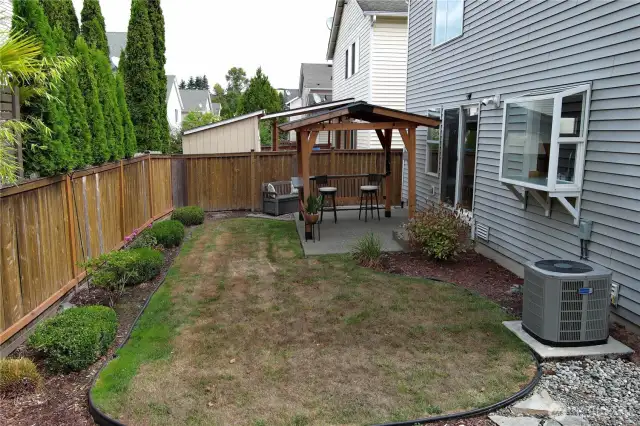 Nice level yard with perennial plantigs to enjoy all year long.