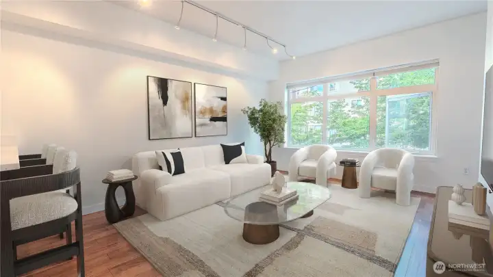 Bright and inviting living room with expansive windows.