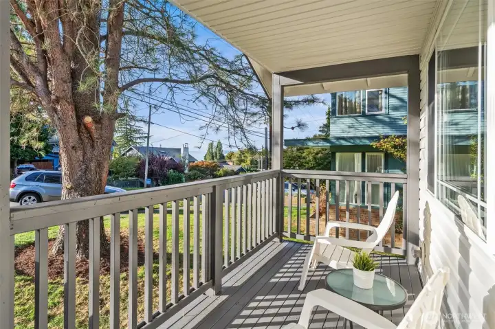 Enjoy summer breezes, stunning sunsets, moonrises, and partial Sound, mountain & Port views from the covered front porch and living room.