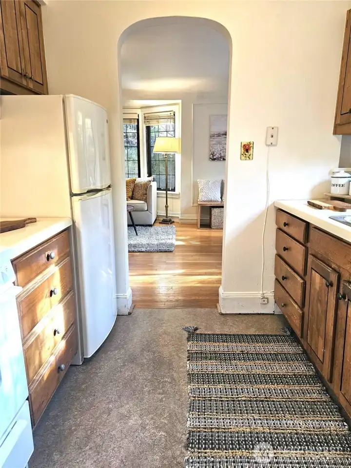 Architectural elements like the arched doorways and coved ceilings are beautiful features that you sacrifice in more modern buildings.