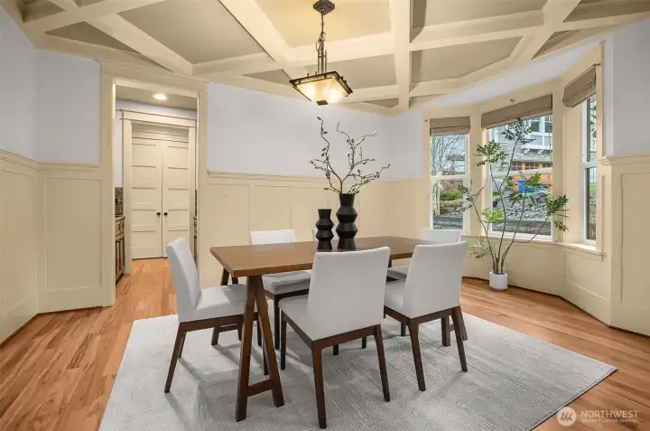 A private dining room adorned with coffered ceilings
