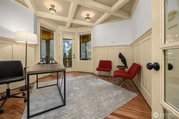 A bedroom with a closet and separate access to the front porch.