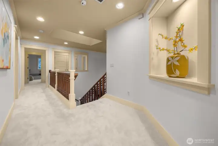 Upper level skylights and high ceilings; alcove spolights