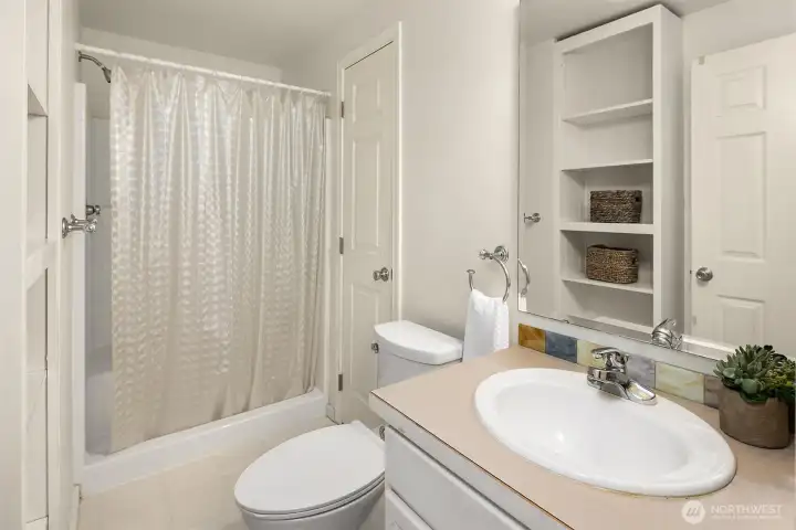 Bathroom off main hall and Bedroom #3.