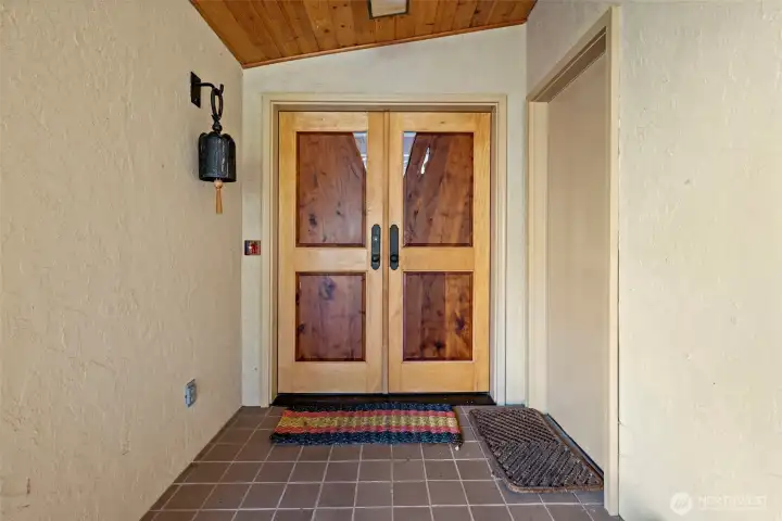 Custom hand crafted Pacific Yew wood doors from fallen tree on this property.