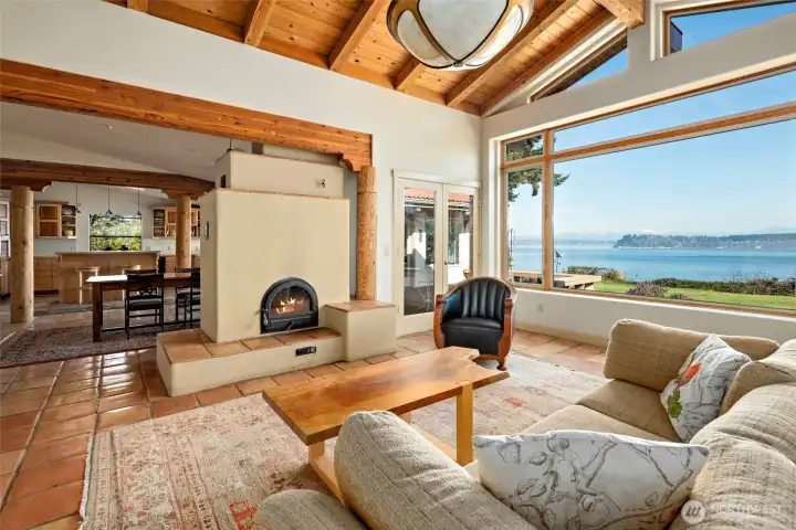 Russian-style fireplace purposefully situated between the living and dining rooms.