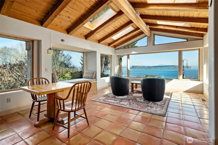 Saltillo tile floors throughout main-level living areas and kitchen.