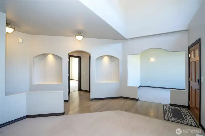 Bright, open entry with the living area conveniently located just off the right of the front door.