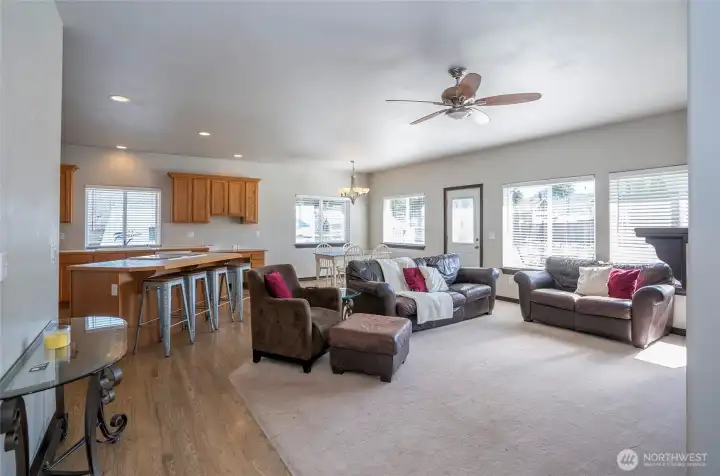 Open family area filled with abundant natural light, creating a bright and inviting space.