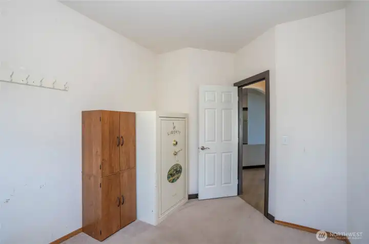 Additional view of the den/office showcasing its flexible and functional layout.