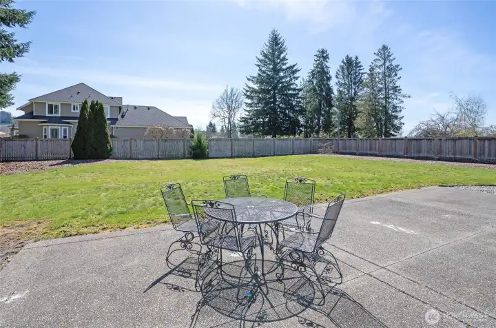 Generous outdoor patio designed for effortless BBQs, gatherings, and entertaining guests in a comfortable setting.