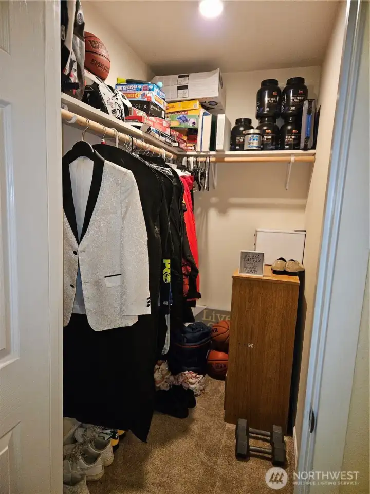 Walk-in closet in bedroom on main floor.