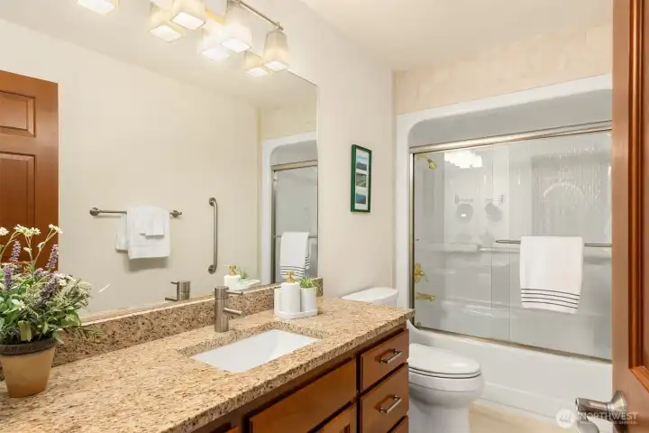 Hall bathroom serves two bedrooms