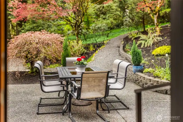 Enjoy dinner in complete privacy on the back patio while overlooking the gardens.