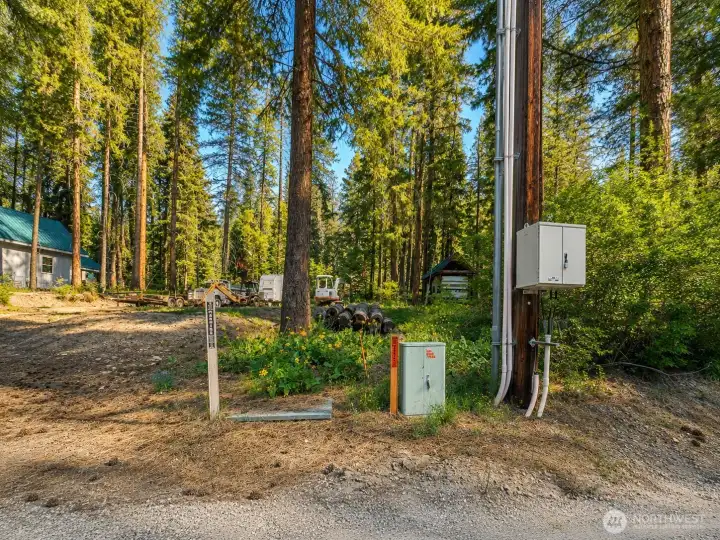 Convenient utility access within a beautifully wooded setting enhances the functionality of this mountain property while preserving its rustic charm and natural beauty.