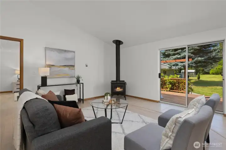 Cozy up to the wood stove for the vibe or use it to heat up the home! Cozy up to the wood stove for the vibe or use it to heat up the home!