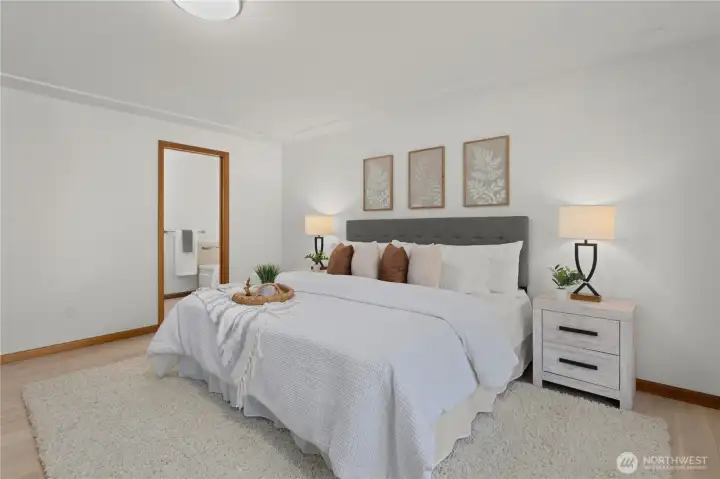The primary bedroom with attached 5-piece primary bathroom. The primary bedroom with attached 5-piece primary bathroom.