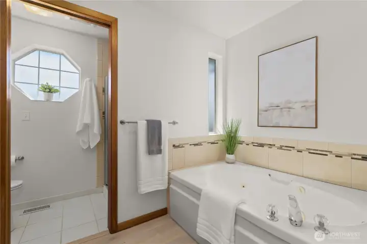A separate shower and jetted tub. A separate shower and jetted tub.
