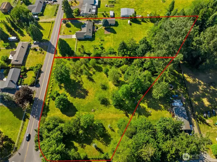 Red line indicates approximate lot lines for the 2 parcels. Red line indicates approximate lot lines for the 2 parcels.