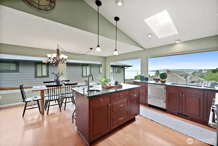 Open kitchen to dining room and family room also with amazing views!