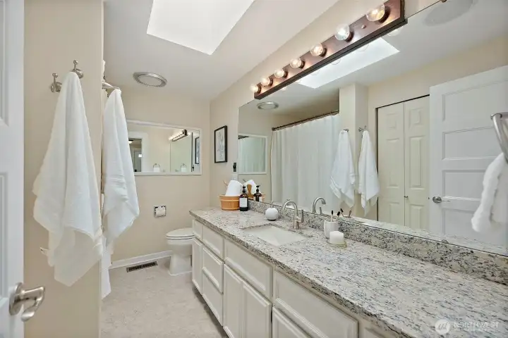 Full guest bath with plenty of storage.