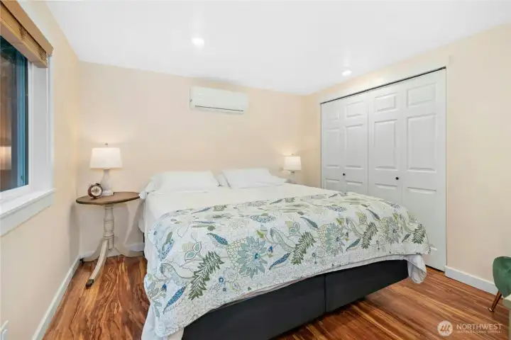larger bedroom with ample storage.