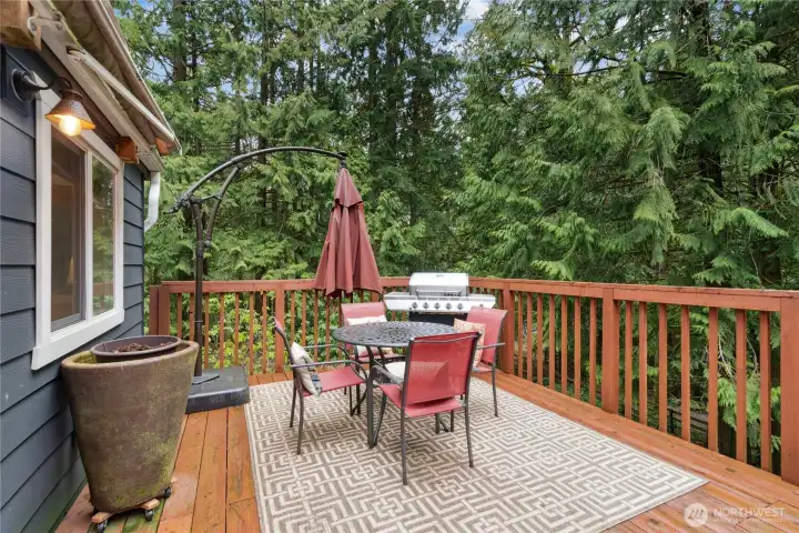 Awning off the home gives you a fun outdoor hangout space even when it rains!