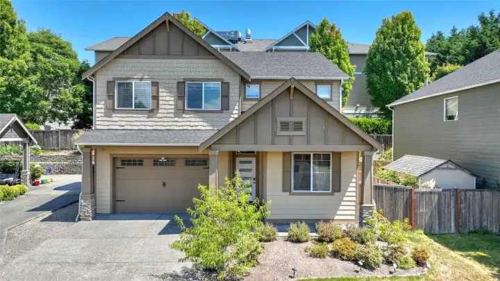 Classic Craftsman curb appeal welcomes you home.