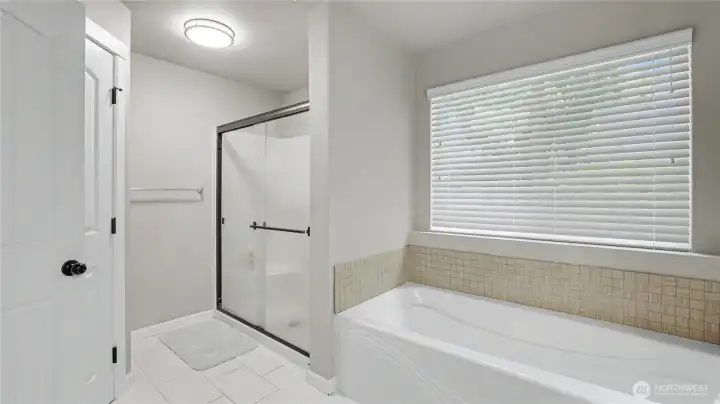 Unwind with a soak in the luxurious tub.