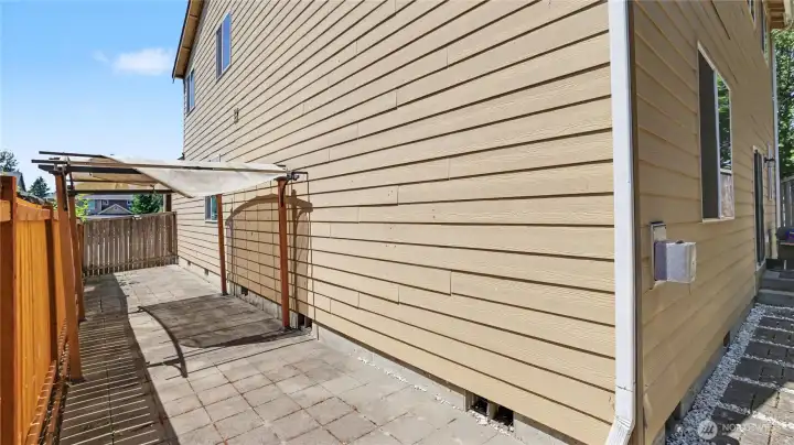 A fully fenced backyard designed for easy living.