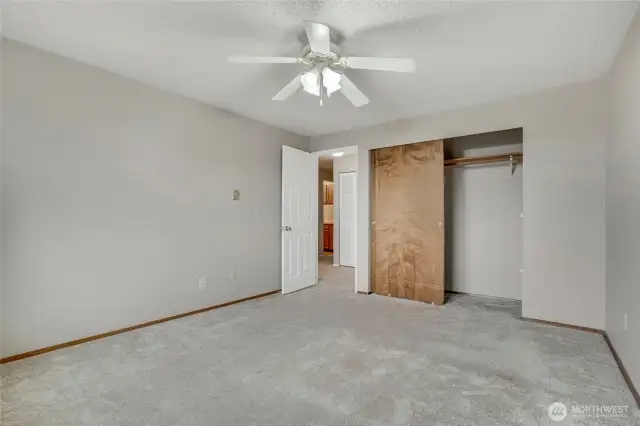 The primary bedroom in this home gives you a blank canvas to put your personal stamp on.