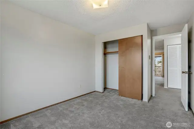 This second bedroom is a cozy and comfortable space that can be used as an office as well.