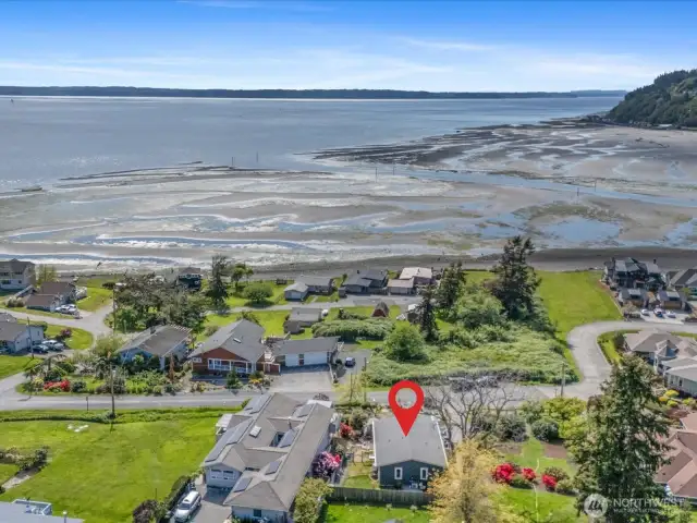 To access the Private Community Waterfront take a left on Bayshore to the 1st right on Possession Shores Rd -continue to the waterfront.