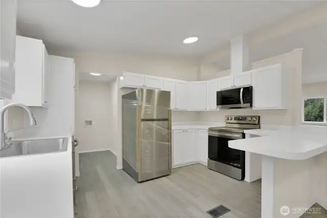 Sparkling Clean chef's style kitchen.