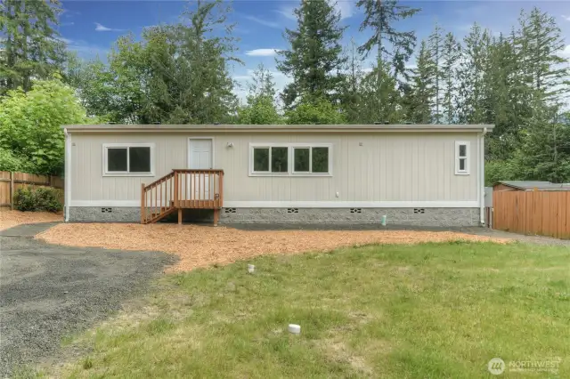 Extra large fully fenced yard with gated entry.
