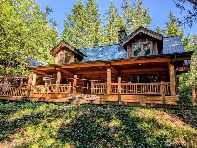 Welcome to this finely crafted log home on 5 acres.