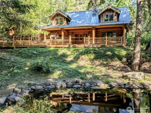 Home sits right above your own pond and waterfall feature.
