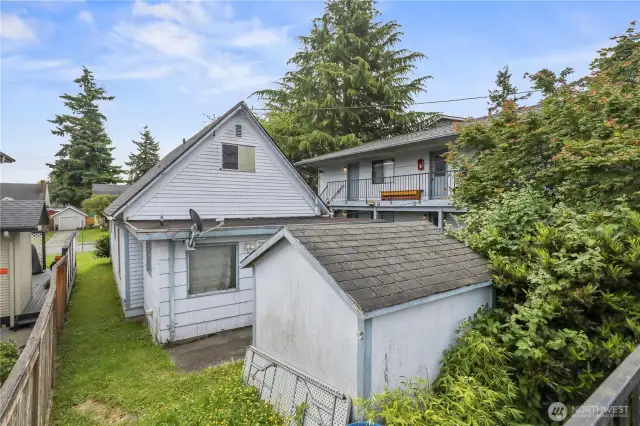Original single-family home and storage shed.