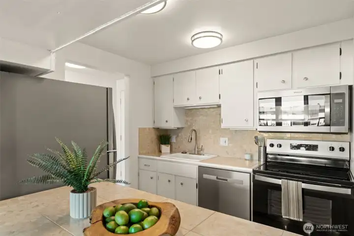 Kitchen with updated appliances.