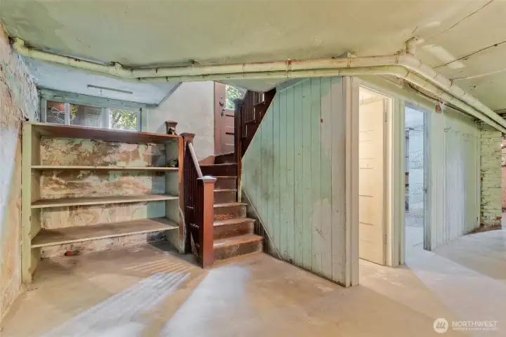 Down to the basement. Good ceiling height and plenty of space.