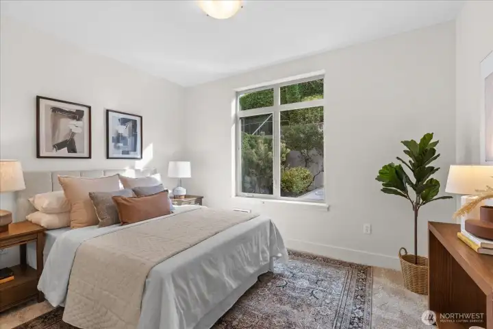 Guest bedroomis located on opposite side of living space, creating a nice separation and privacy from primary bedroom.